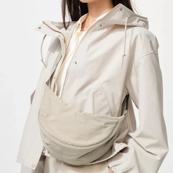 Uniqlo Beige Crescent Nylon Round Bag🥠 - Picture 2 of 15